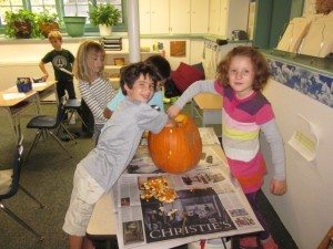 Preparing our Halloween pumpkin!