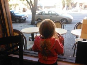 Looking out at the busy street.